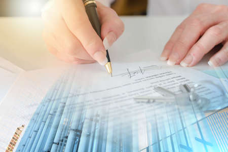 Client signing a real estate contract in real estate agency; multiple exposure