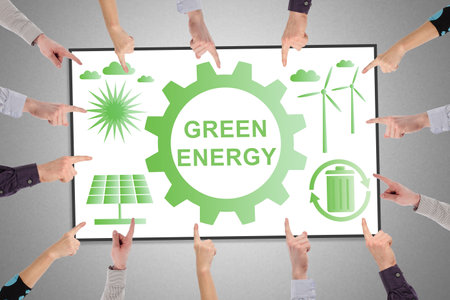 Hands pointing to green energy conceptの写真素材