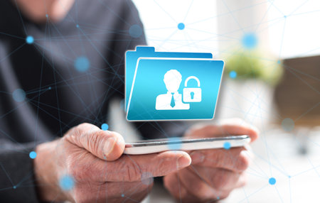 Hands of man holding a smartphone with personal data security concept