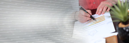 Businesswoman analyzing marketing data; panoramic banner