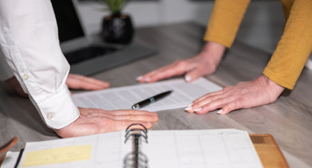 Situation of business negotiation between businesswoman and businessman