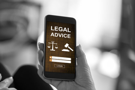 Smartphone screen displaying a legal advice conceptの写真素材