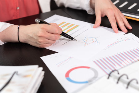 Businesswoman analyzing marketing data