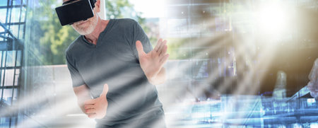 Senior man using a virtual reality headset; multiple exposure