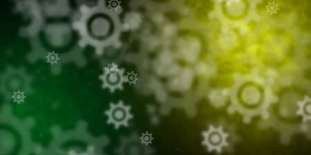 Flying cog wheels over green and lemon yellow backgroundの写真素材