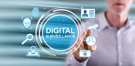 Man touching a digital surveillance concept on a touch screen with his finger