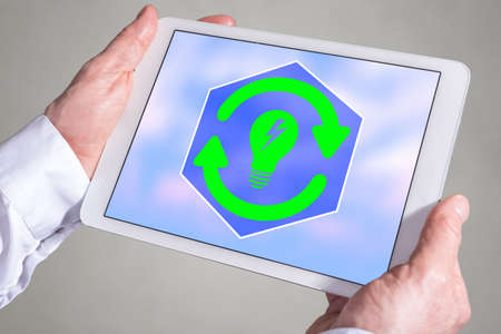 Tablet screen displaying a renewable energy concept