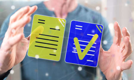Document validation concept between hands of a man in background
