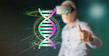 Man with vr headset touching a transhumanism concept on a touch screen with his fingerの写真素材