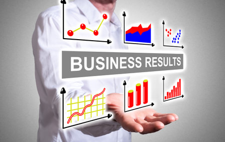 Business results concept levitating above a human handの写真素材