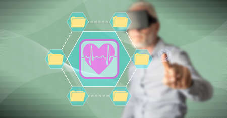 Man with vr headset touching a medical record concept on a touch screen with his finger