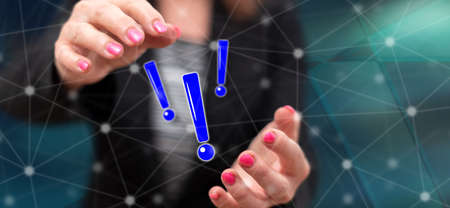Caution concept between hands of a woman in background