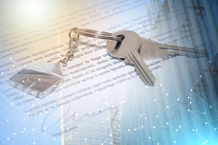 Closeup of house keys on a signed contract; multiple exposure