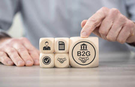 Wooden blocks with symbol of b2g conceptの写真素材
