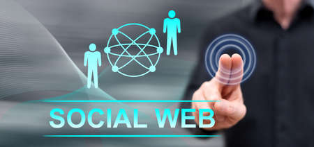 Man touching a social web concept on a touch screen with his fingers