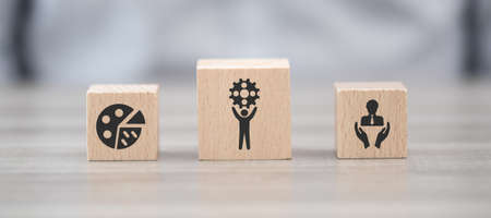 Wooden blocks with symbol of business support conceptの写真素材