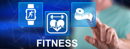 Man touching a fitness concept on a touch screen with his fingerの写真素材