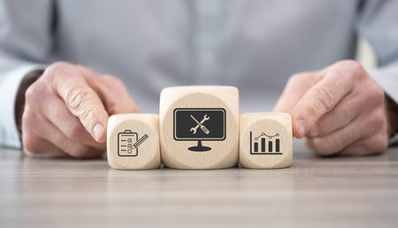 Wooden blocks with symbol of system maintenance concept
