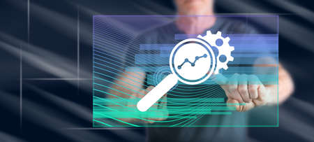 Man touching a market research concept on a touch screen with his fingers