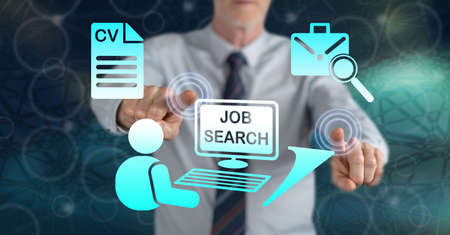 Man touching a job search concept on a touch screen with his fingersの写真素材