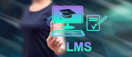 Woman touching a lms concept on a touch screen with her fingerの写真素材