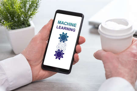 Smartphone screen displaying a machine learning conceptの写真素材