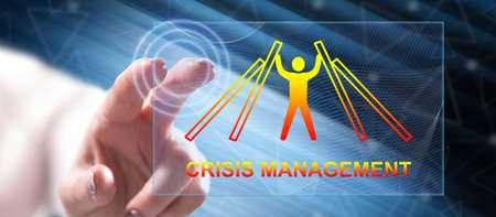 Woman touching a crisis management concept on a touch screen with her finger