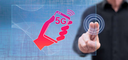 Man touching a 5g concept on a touch screen with his fingers