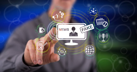 Man touching a fake news concept on a touch screen with his fingerの写真素材