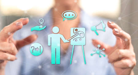 Coaching concept between hands of a woman in backgroundの写真素材