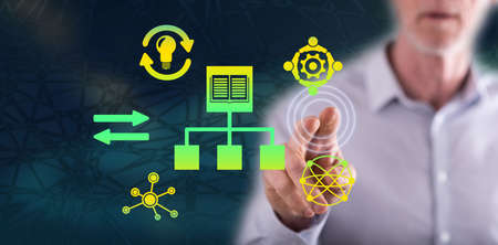 Man touching a knowledge sharing concept on a touch screen with his finger