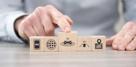Wooden blocks with symbol of autonomous car concept