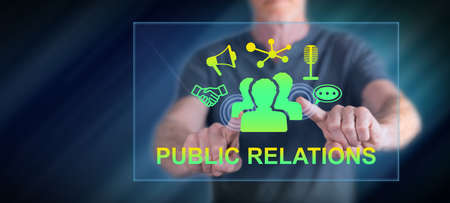 Man touching a public relations concept on a touch screen with his fingersの写真素材