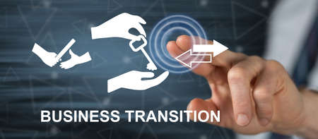 Man touching a business transition concept on a touch screen with his fingerの写真素材