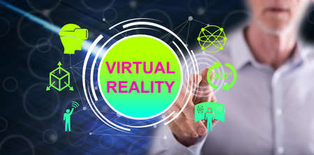 Man touching a virtual reality concept on a touch screen with his fingerの写真素材