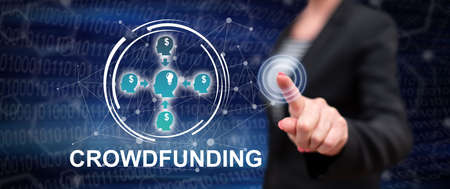 Woman touching a crowdfunding concept on a touch screen with her finger