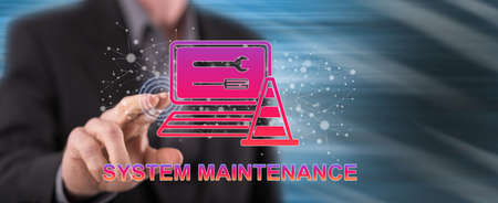 Man touching a system maintenance concept on a touch screen with his fingerの写真素材