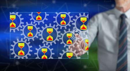 Man touching a deadline concept on a touch screen with his finger