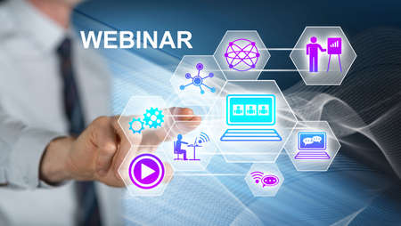 Man touching a webinar concept on a touch screen with his finger