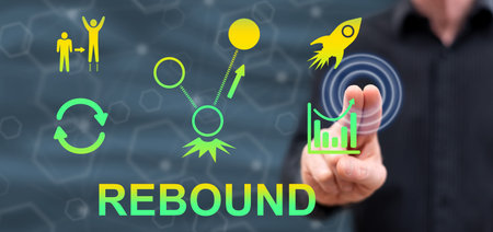 Man touching a rebound concept on a touch screen with his fingersの写真素材