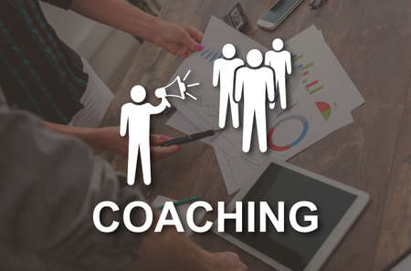 Coaching concept illustrated by a picture on backgroundの写真素材