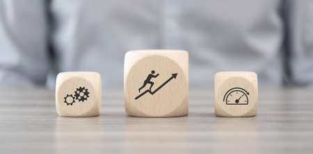Wooden blocks with symbol of motivation conceptの写真素材
