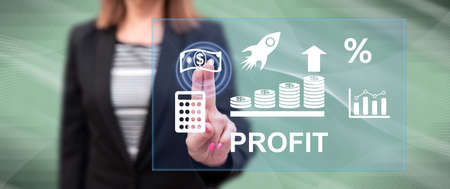 Woman touching a profit concept on a touch screen with her fingers