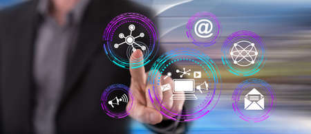 Man touching an online marketing concept on a touch screen with his finger
