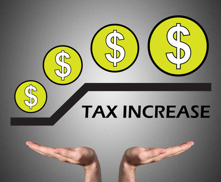 Open hands sustaining tax increase conceptの写真素材