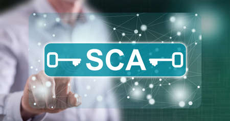 Man touching a sca concept on a touch screen with his finger
