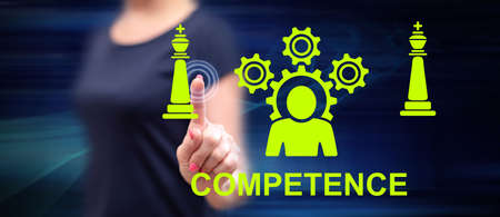 Woman touching a competence concept on a touch screen with her fingerの写真素材