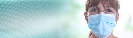 Portrait of mature woman wearing a medical face mask; panoramic banner