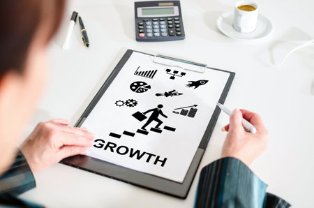 Woman looking at a growth conceptの写真素材