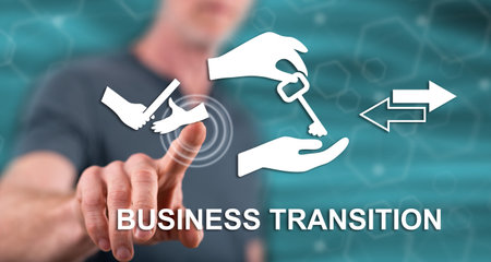 Man touching a business transition concept on a touch screen with his fingerの写真素材